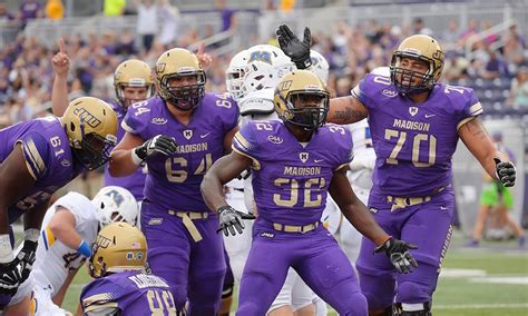 Jmu football - CONWAY, S.C. – Jordan McCloud accounted for six touchdowns with three score connections to Elijah Sarratt, who added a rushing touchdown, as No. 24 James Madison dominated Coastal Carolina 56-14 on Saturday afternoon at Brooks Stadium to finish alone atop the Sun Belt Conference East Division. The Dukes concluded the 2023 …